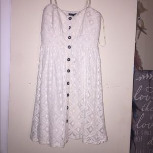 White mini dress with button